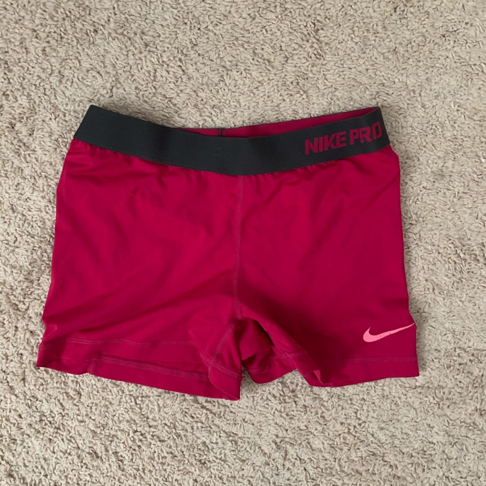 Hot pink Nike Pros size M